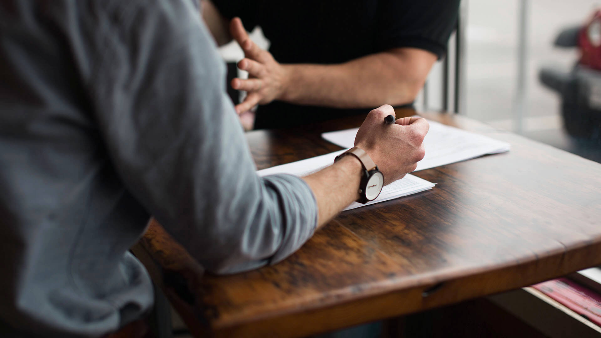 bg-two-people-table-unsplash